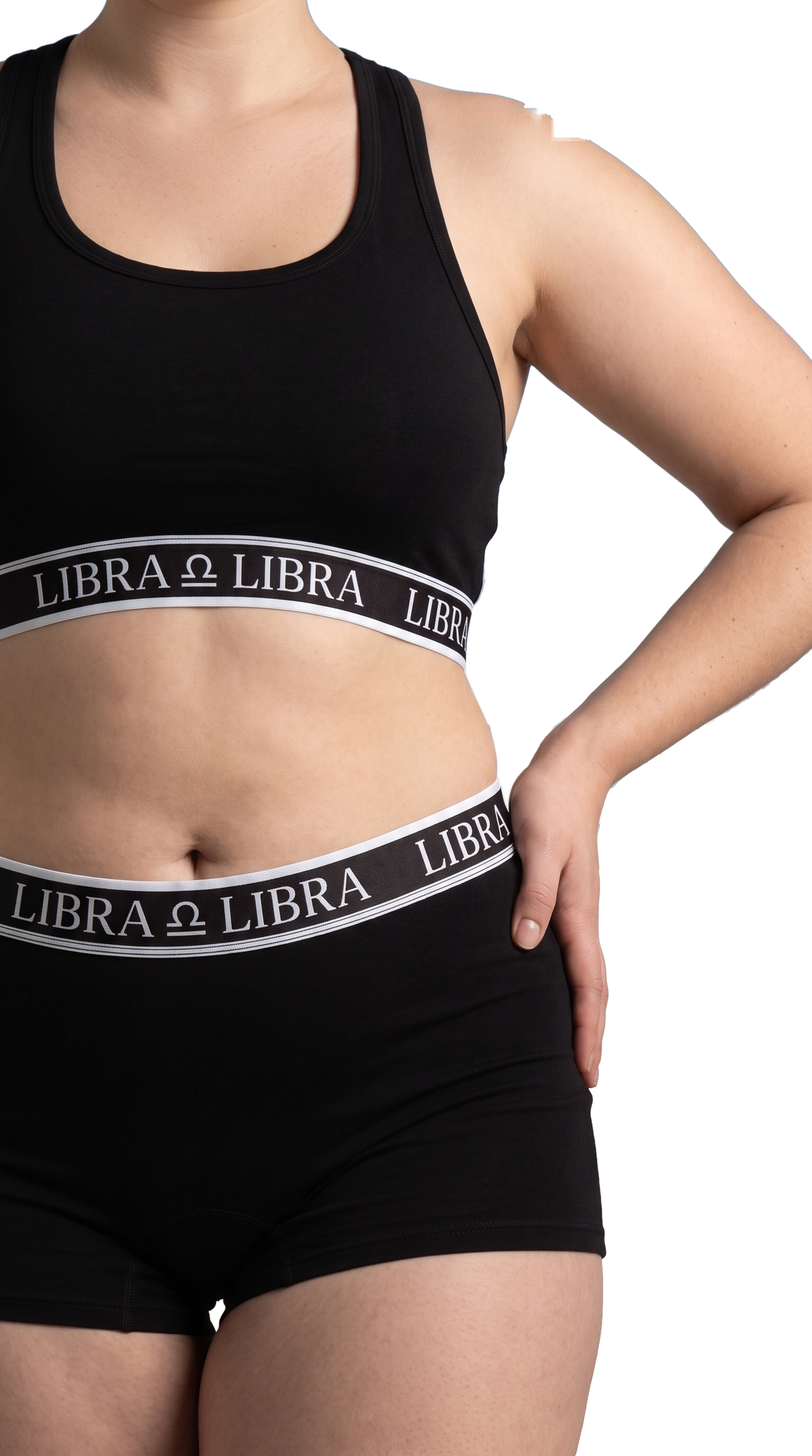 Model wearing AstroWorld Libra Sport Bra Set in Black, front view